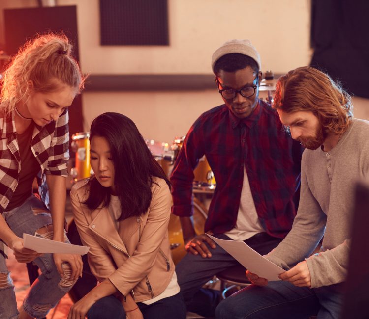 Creative recovery group therapy together while rehearsing in record studio offered for artists in recovery